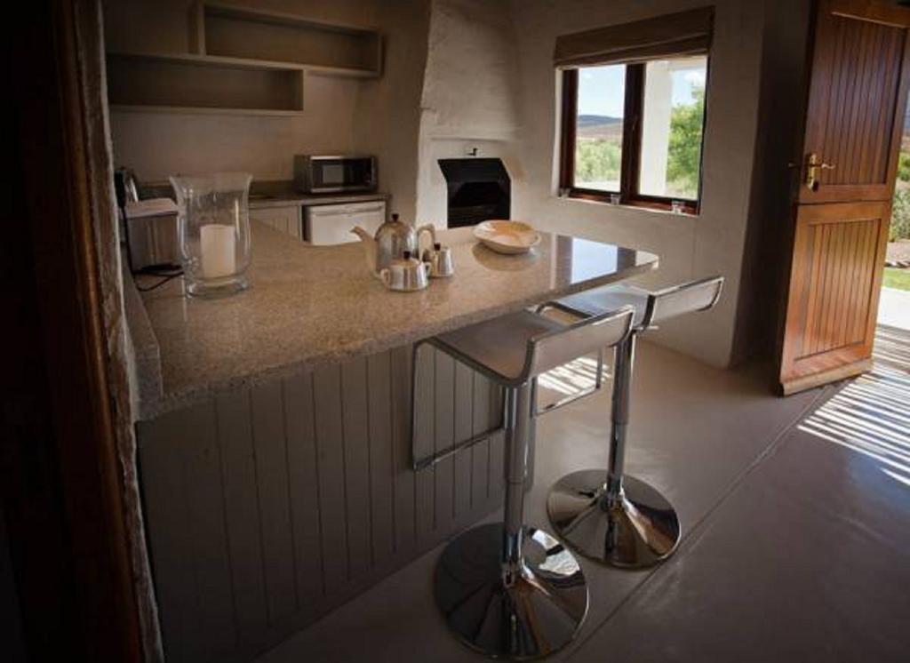 Vrisch Gewagt Boutique Self-Catering Olive Farm Pensionat Prince Albert Værelse billede